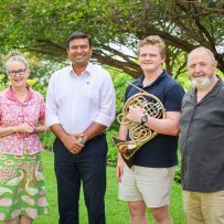 Darwin Symphony Orchestra Chair Claire Kilgariff, Minister for Arts Jinson Charls, youth musician Jethro Llewellyn and Darwin Symphony Orchestra Artistic Director and Chief Conductor Richard Mills AO. Photo credit: Courtesy of the Office of Jinson Anto Charls MLA 